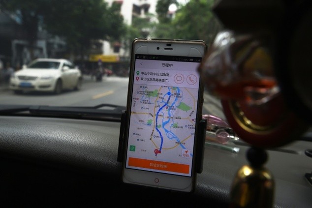 Didi Chuxing Buys Uber Operations in China